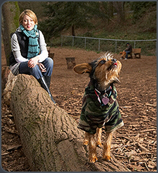 Sharon Lee with a client dog at a Tampa Bay dog park